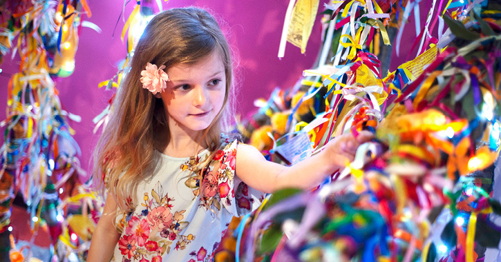 Little girl playing inside the Oriental Museum, Durham City